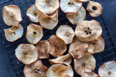 Apple chips on a cooling rack.