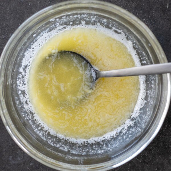 Melted butter with garlic.