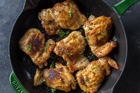 Frying pan with Blackened Chicken.