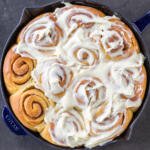 Cinnamon rolls with icing on top.