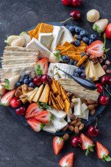 Cheese Board with nuts and berries.