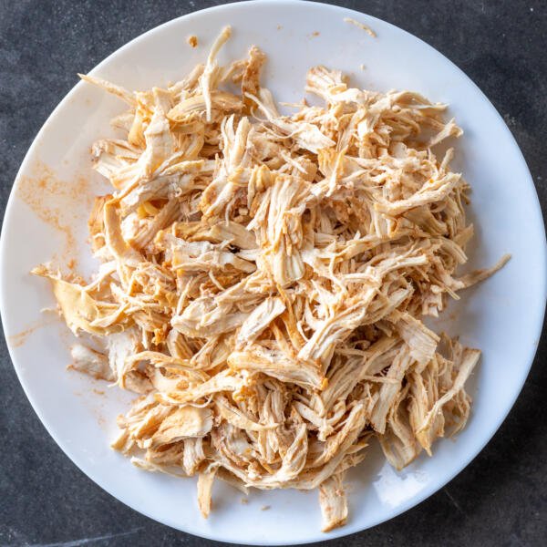 Shredded chicken on a plate.