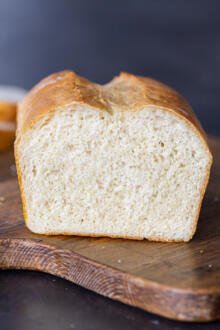 Cottage Cheese Bread on a cutting board.