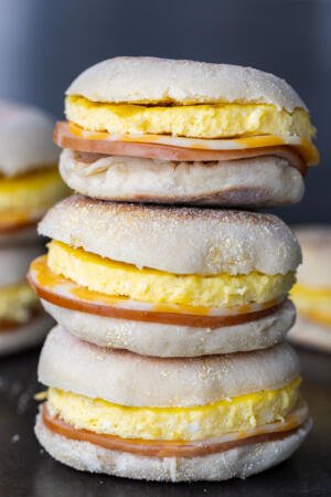 English Muffin Breakfast Sandwiches on top of each other.