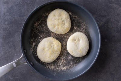English Muffins on a frying pan.