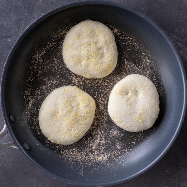 English Muffins on a frying pan.