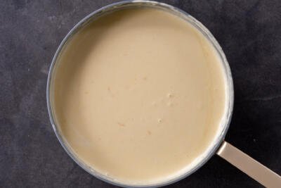 Cheese added to creamy sauce.