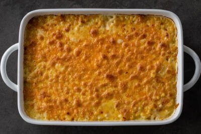Baked Macaroni and cheese with cheese on top.
