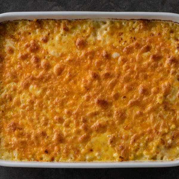 Baked Macaroni and cheese with cheese on top.
