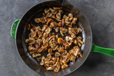 Browned mushrooms in a pan.
