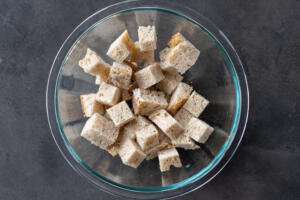 Bread cut up in a bowl.