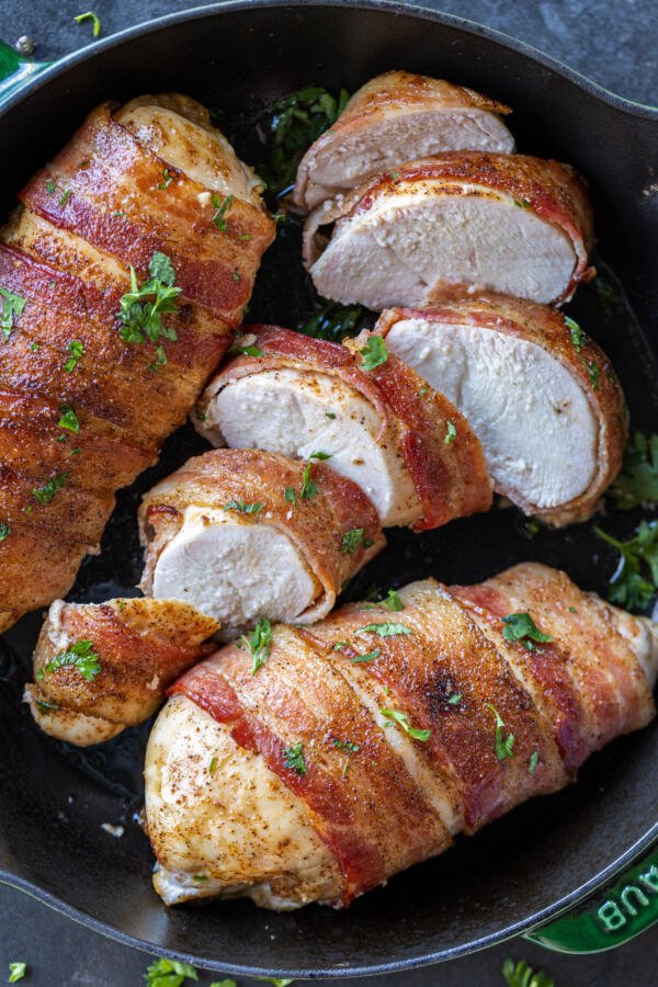 Sliced up Bacon Wrapped Chicken Breasts.