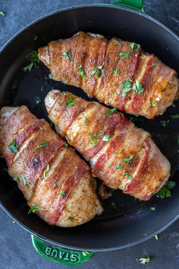 Bacon Wrapped Chicken Breasts in a serving pan. 