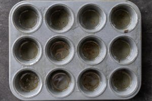 Oiled muffin pan.