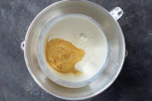 Heavy cream, condensed milk and vanilla in a mixing bowl.