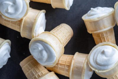 Plombir Ice Cream cones next to each other.