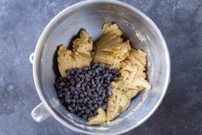 Chocolate chips added to cookie dough.