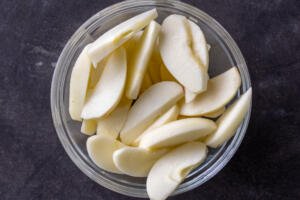 Sliced apples in a bowl.