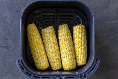 Air Fryer Corn on the Cob in a basket.