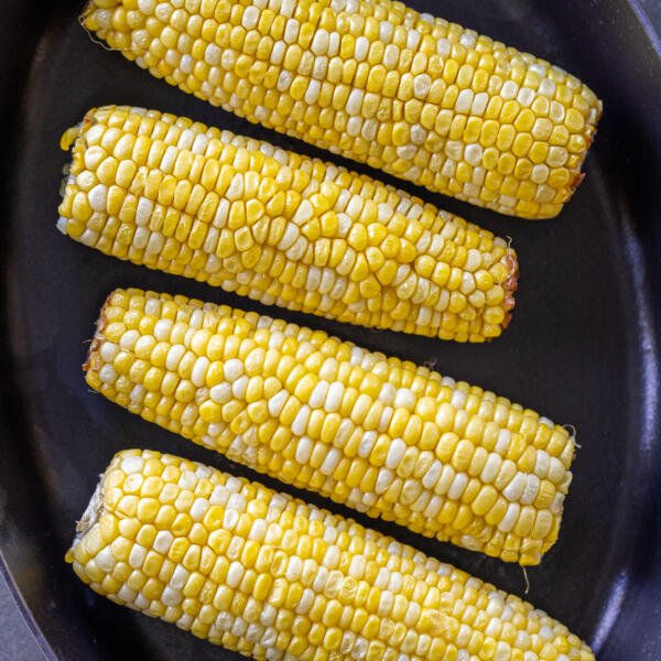 Air Fryer Corn on the Cob in a serving dish.