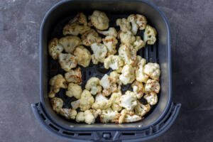 Air Fryer Roasted Cauliflower in a baskeet.