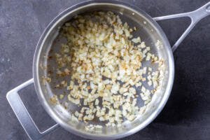 Sauteed onions in a pan.