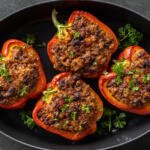 Serving dish with stuffed peppers.