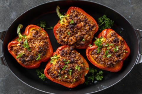Serving dish with stuffed peppers.