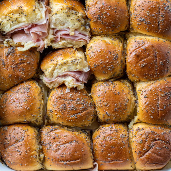 Baked Ham and Cheese Sliders with a few pulled out.