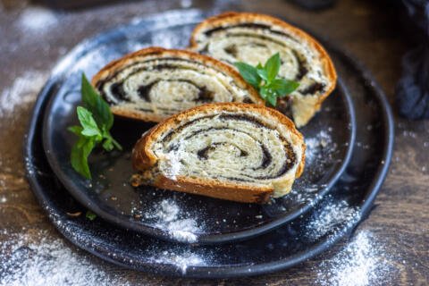Sliced Poppy Seed Roll plated.