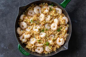 Shrimp Orzo in a cooking pan.