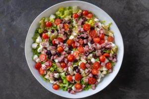 Bowl with Antipasto Salad ingredients.