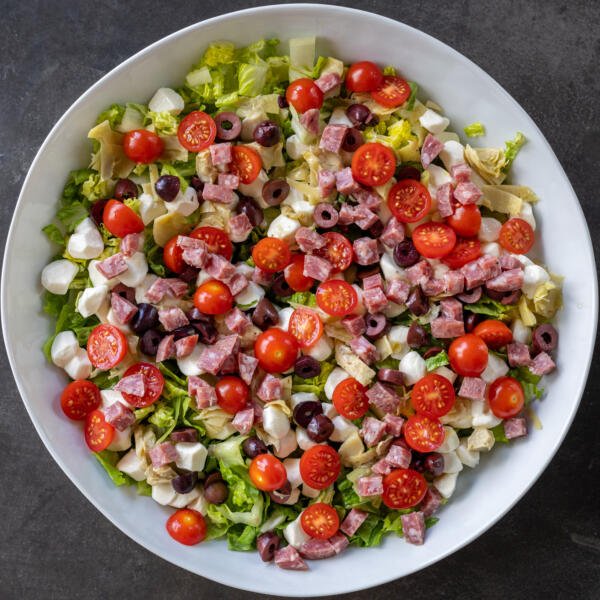 Bowl with Antipasto Salad ingredients.