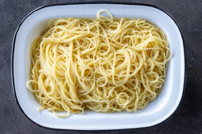 Cooked pasta in a pan.