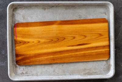 Cedar plank soaking in water.