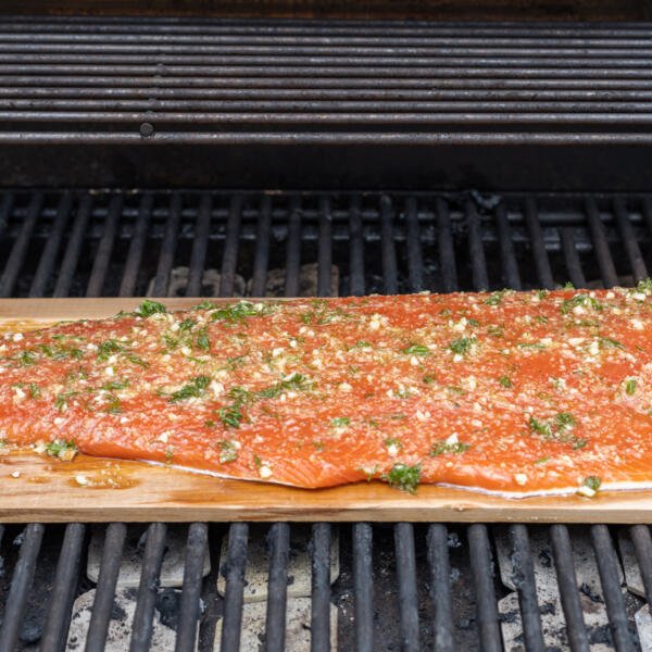 Cedar Plank Salmon on a grill.