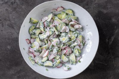 Creamy Cucumber Radish Salad with sour cream.
