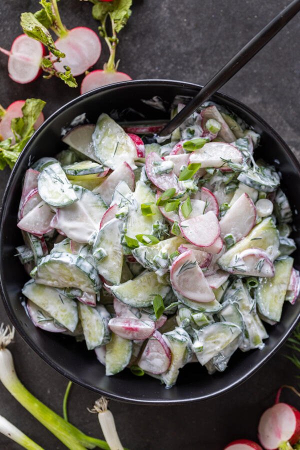 Creamy Cucumber Radish Salad in a bowl.