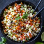 A serving bowl with Fresh Pineapple Salsa.