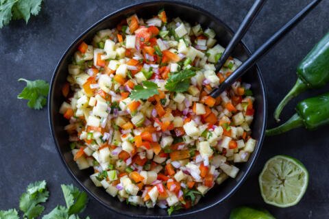 A serving bowl with Fresh Pineapple Salsa.