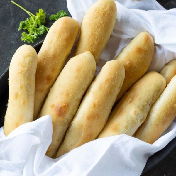 Baked Olive Garden Breadsticks in a towel.