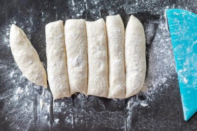 Sliced dough in to pieces.