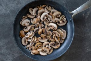 Frying pan with mushrooms in a pan.