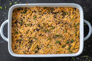 Sushi Bake with salmon in a pan.