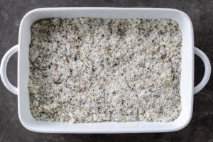 Sushi rice with Furikake in a baking pan.