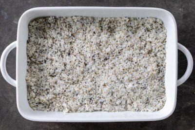 Sushi rice with Furikake in a baking pan.