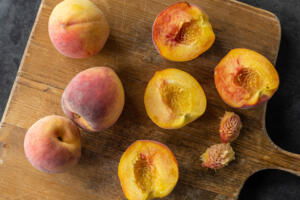 Sliced peaches open.