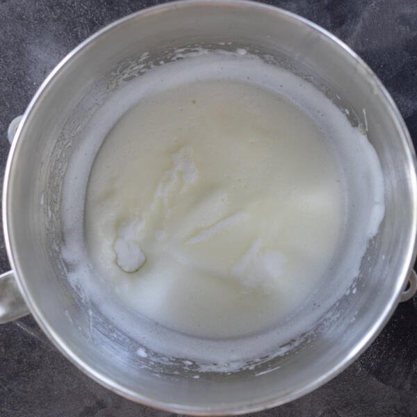 Whisked egg whites in a mixing bowl.