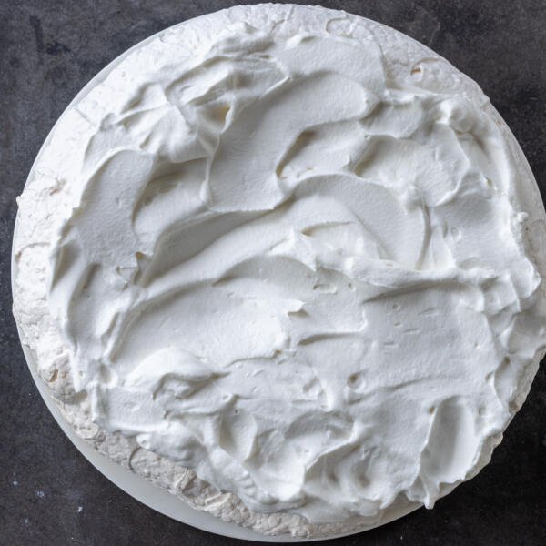 Pavlova with cream on top.