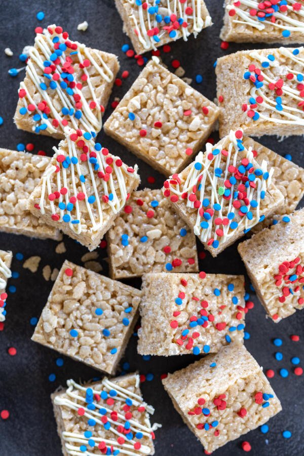 Rice Crispy Treat cut in pieces on a serving tray.